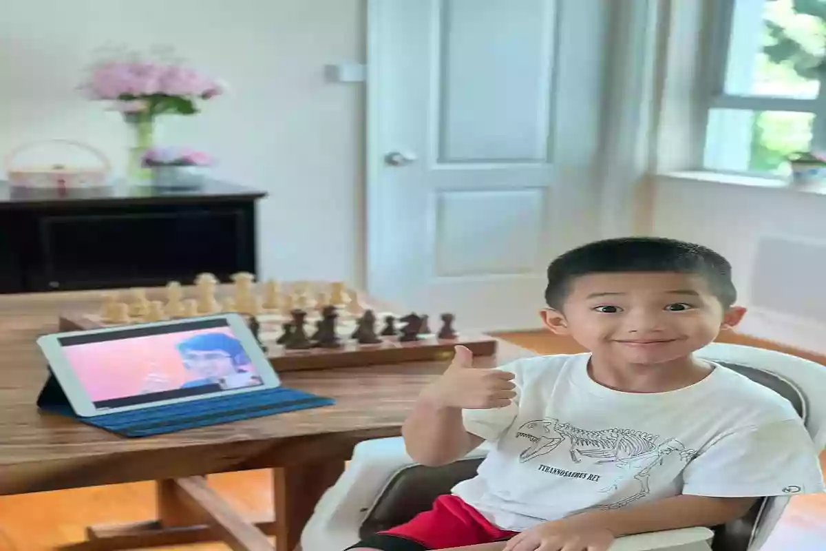 Kid playing Chess.